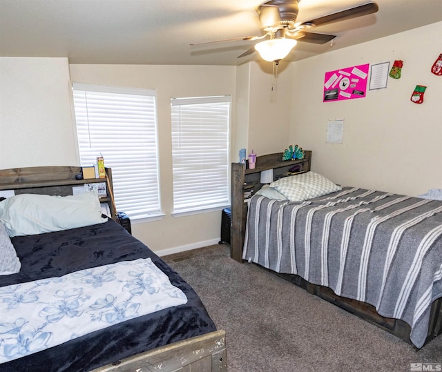 bedroom with ceiling fan and carpet