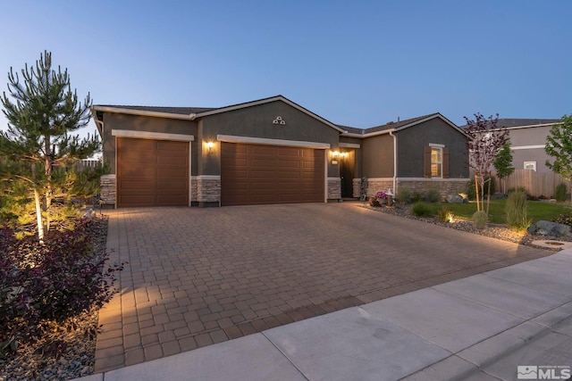 view of front of home with a garage