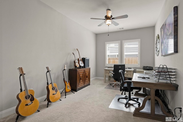 carpeted office with ceiling fan