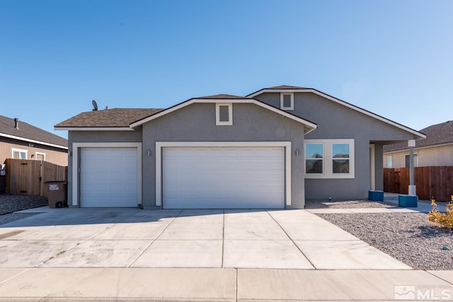 ranch-style home with a garage