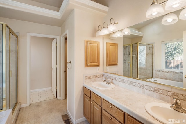 bathroom featuring vanity and an enclosed shower