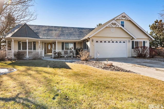 view of front of home featuring a front lawn, a porch, and a garage