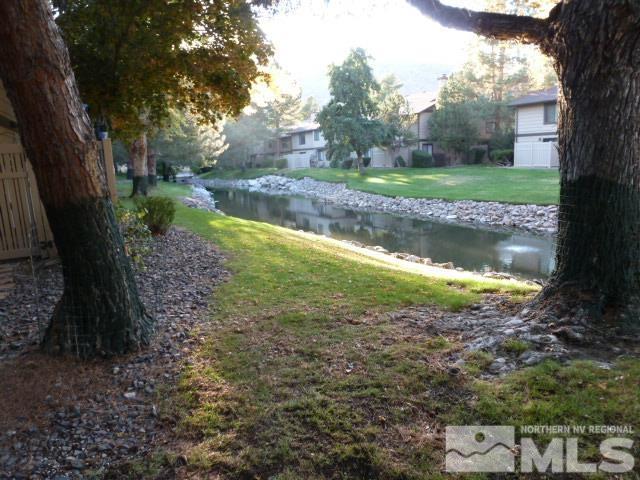 view of yard with a water view