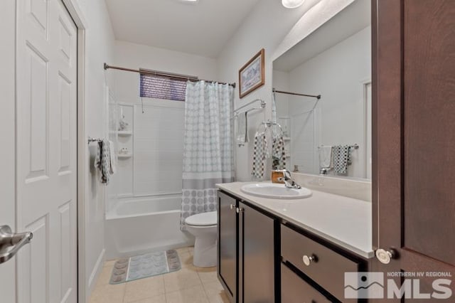 full bathroom featuring tile patterned flooring, vanity, toilet, and shower / bathtub combination with curtain