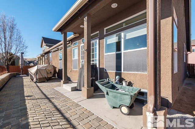 view of patio / terrace featuring a grill