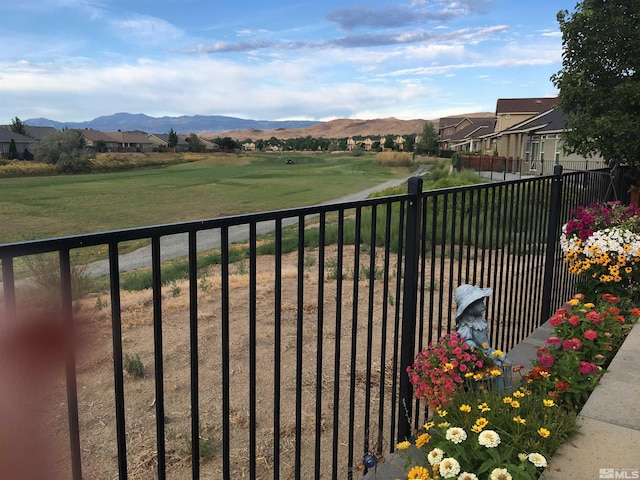 view of gate featuring a mountain view