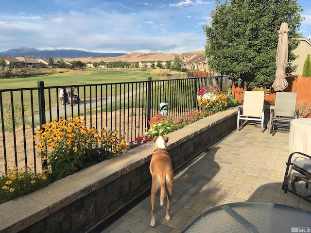 view of patio featuring a mountain view