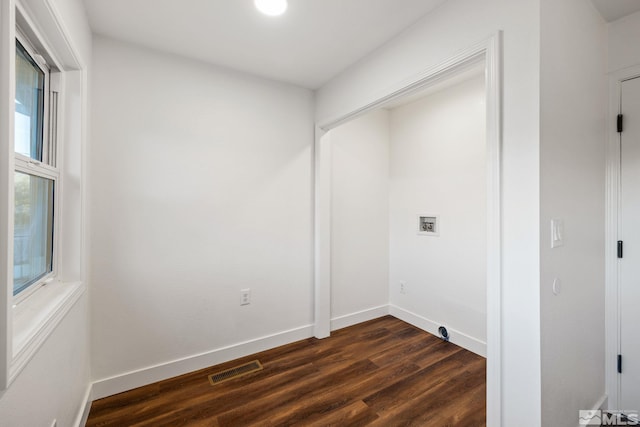 laundry room with hookup for a washing machine and dark hardwood / wood-style flooring