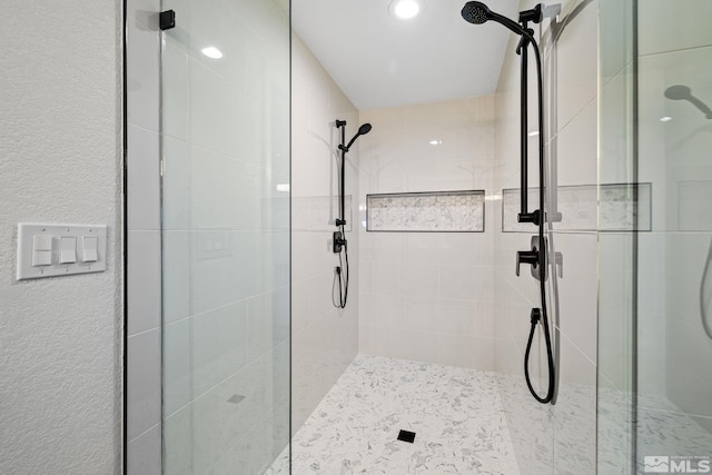 bathroom with an enclosed shower