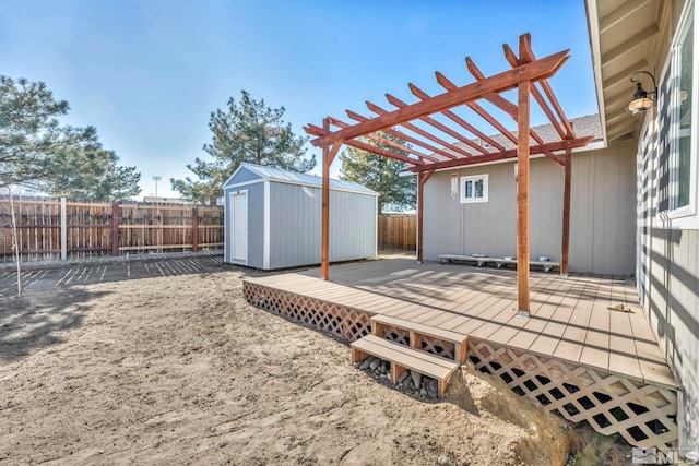 view of yard with a pergola, a wooden deck, and a storage shed