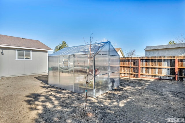 exterior space with an outbuilding