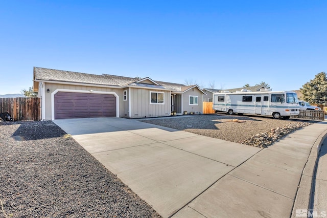 ranch-style home with a garage