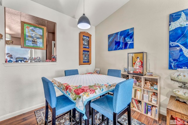 dining room with hardwood / wood-style floors