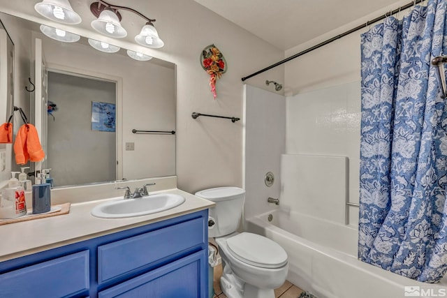 full bathroom featuring tile patterned flooring, vanity, toilet, and shower / bathtub combination with curtain