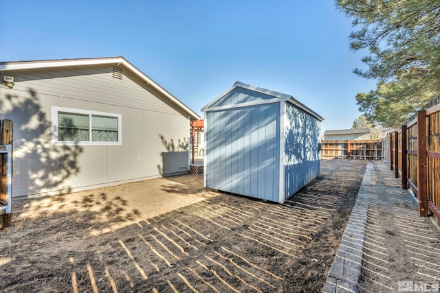 exterior space with a storage shed