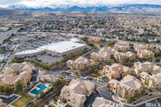 birds eye view of property featuring a mountain view