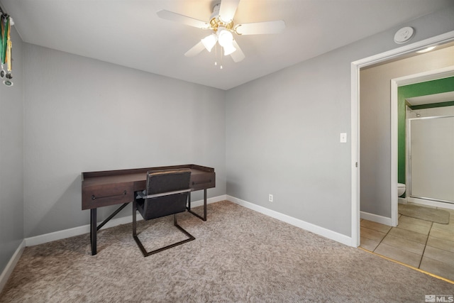 office area with light colored carpet and ceiling fan