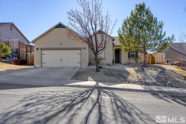 ranch-style home featuring a garage