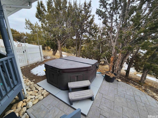 view of patio / terrace featuring a hot tub