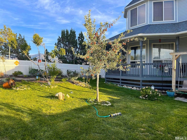 view of yard with a deck