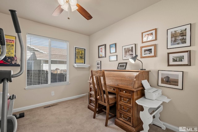 office area with light colored carpet and ceiling fan