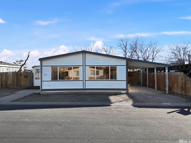 view of front of house with a carport