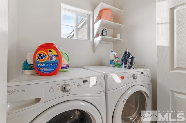 laundry room with washing machine and dryer