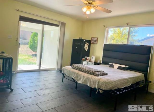 bedroom featuring access to outside and ceiling fan