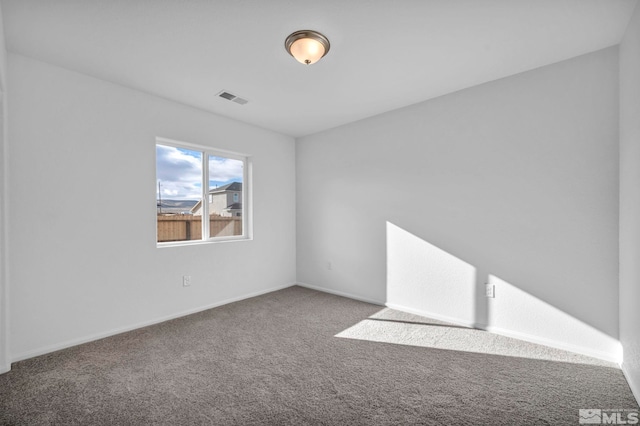 view of carpeted spare room