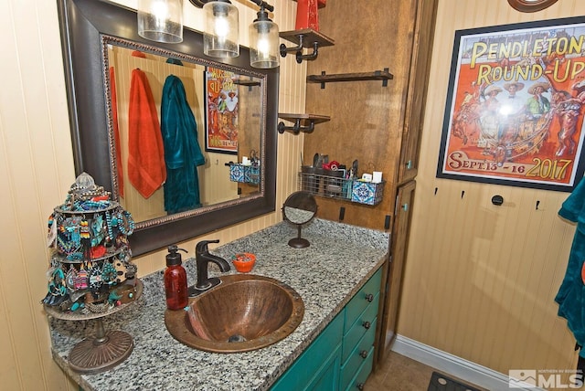 bathroom featuring tile patterned floors and vanity