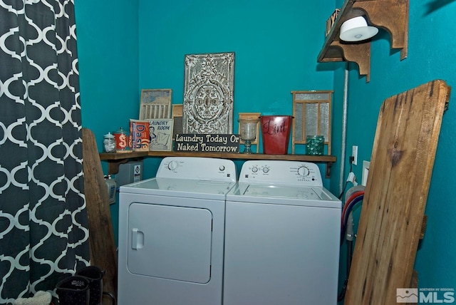 laundry area featuring washer and clothes dryer