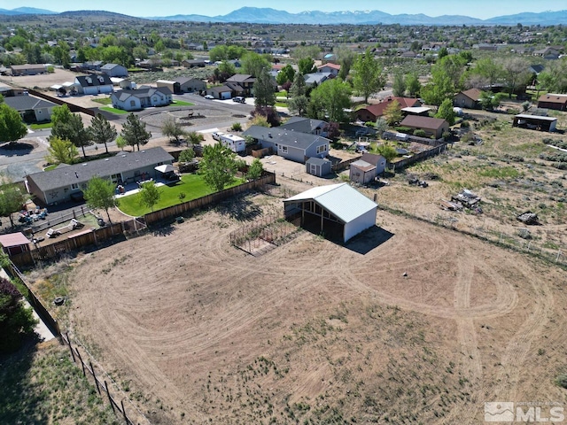 drone / aerial view featuring a mountain view