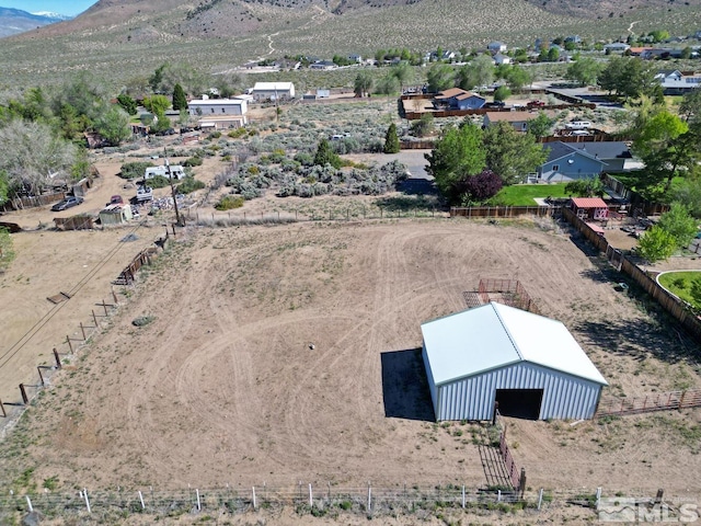 aerial view with a mountain view and a rural view