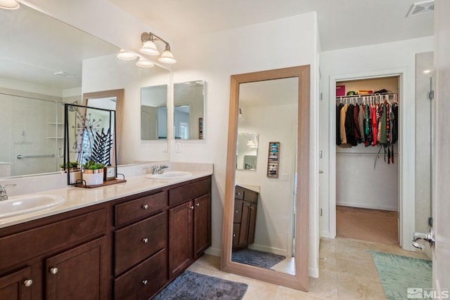 bathroom featuring vanity and tile patterned floors