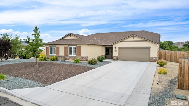 ranch-style house featuring a garage