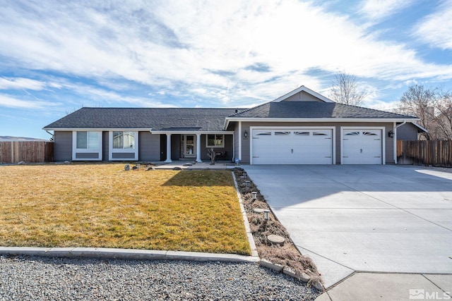 ranch-style house with a front lawn and a garage