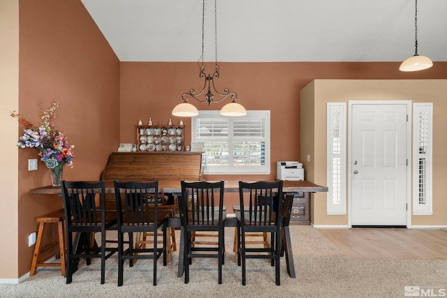 view of carpeted dining space