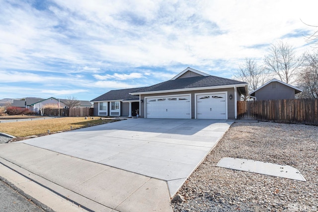 ranch-style home with a garage