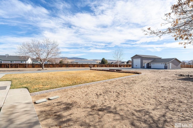 view of yard with a garage