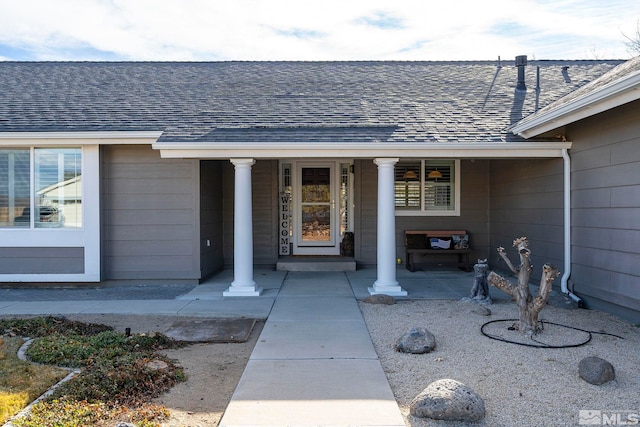 property entrance featuring covered porch