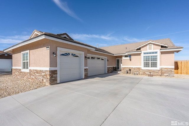 view of front of home with a garage