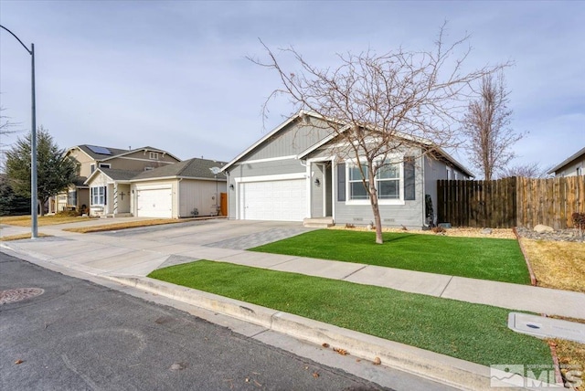 view of front facade featuring a front lawn and a garage