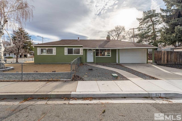 single story home featuring a garage