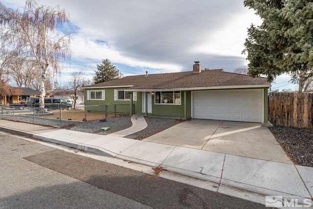 ranch-style home featuring a garage