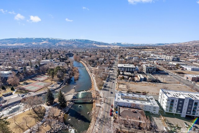 bird's eye view featuring a water and mountain view