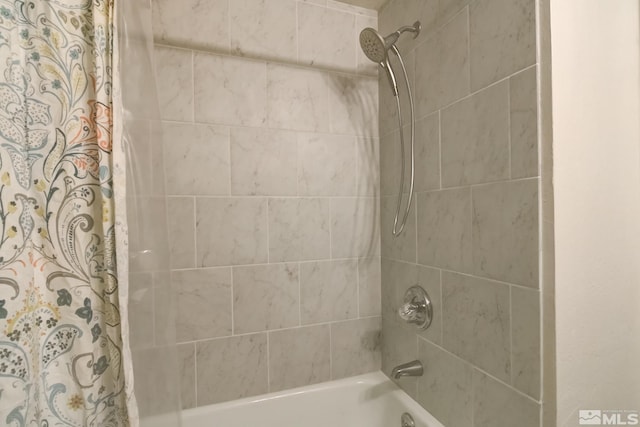 bathroom featuring shower / bath combination with curtain