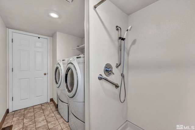 laundry area with independent washer and dryer