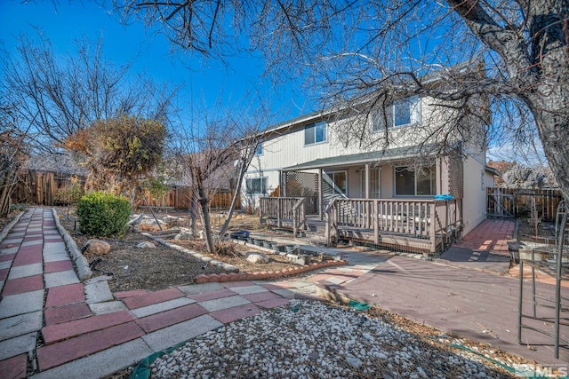 view of front of home with a deck