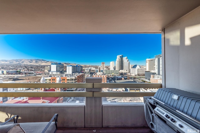 balcony featuring a mountain view