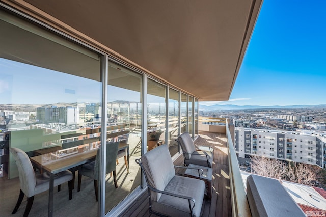 balcony featuring a mountain view